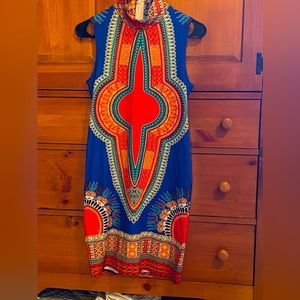 Size small multicolored sleeveless women’s stretch dress. Zips up back. Comfy